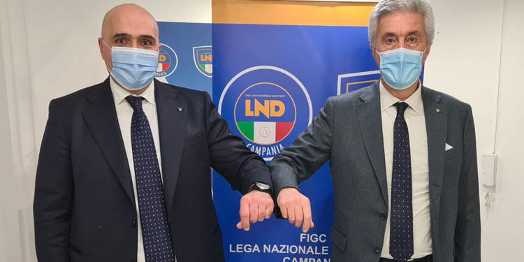 A sinistra il rieletto presidente del Comitato regionale Figc Carmine Zigarelli, a destra il presidente della Lnd Cosimo Sibilia
