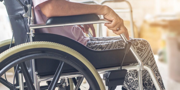 Asian senior or elderly old lady woman patient on wheelchair so sad at home,healthy strong medical concept